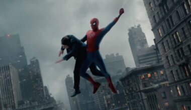 A screenshot from a Spider-Man: Brand New Day trailer clip featuring Spider-Man web-swinging while holding a man