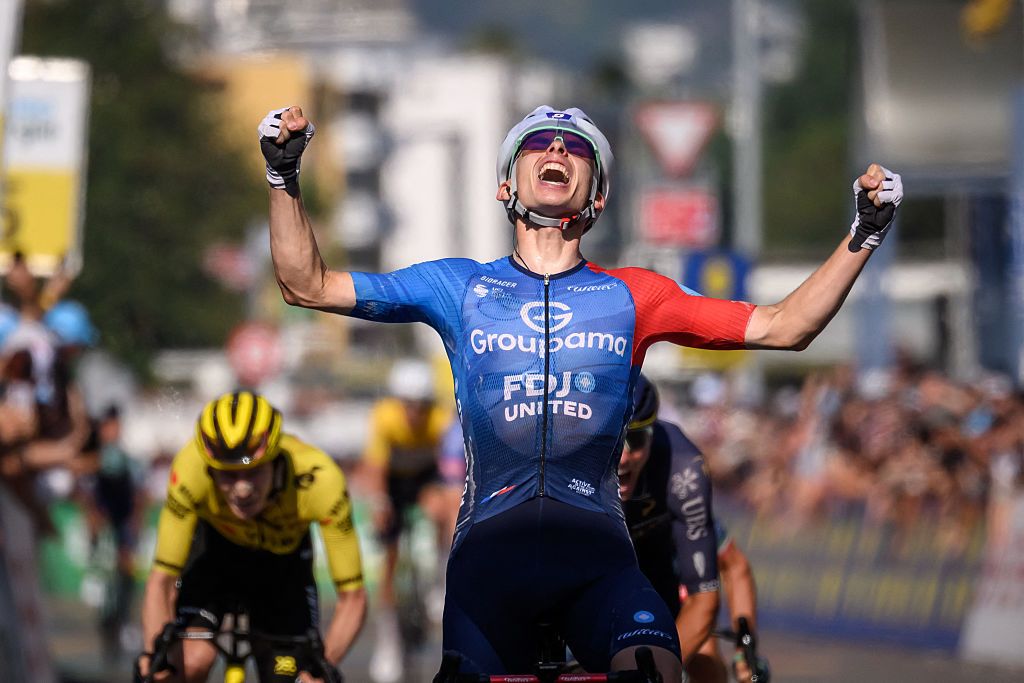 Groupama-FDJ's French rider Romain Gregoire celebrates as he crosses the finish line to win the second stage 157,7km from Locarno to Locarno at the Men&rsquo;s Tour of Switzerland (Tour de Suisse) cycling race in Locarno, Switzerland, on June 18, 2026. (Photo by Fabrice COFFRINI / AFP)