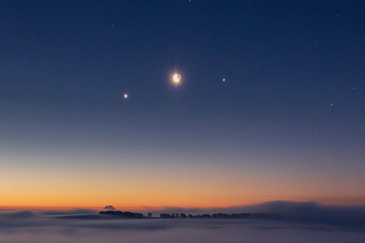 Venus, Jupiter and a crescent Moon. Credit: John Finney Photography / Getty Images