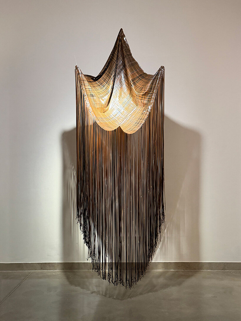 VHS tapes and cassette recordings replace yarn in a woven archive of collective memory - 7