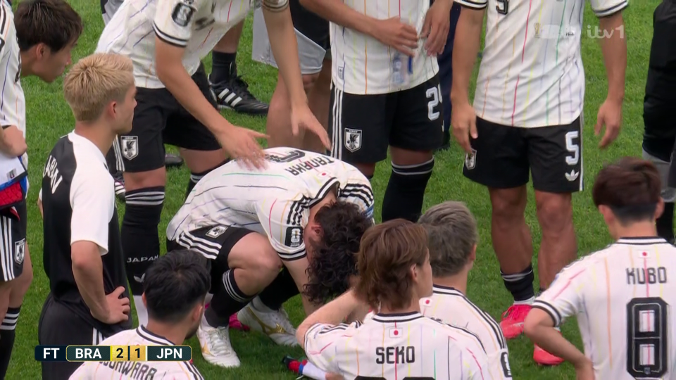 Tanaka was inconsolable in Japan's huddle after their round of 32 exit