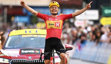 Charmig celebrates with both arms up