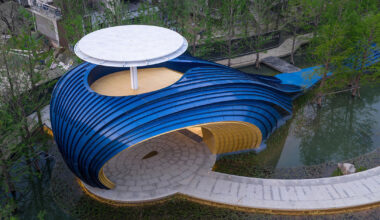 blue aluminum panels shape whale-like gate by wutopia lab