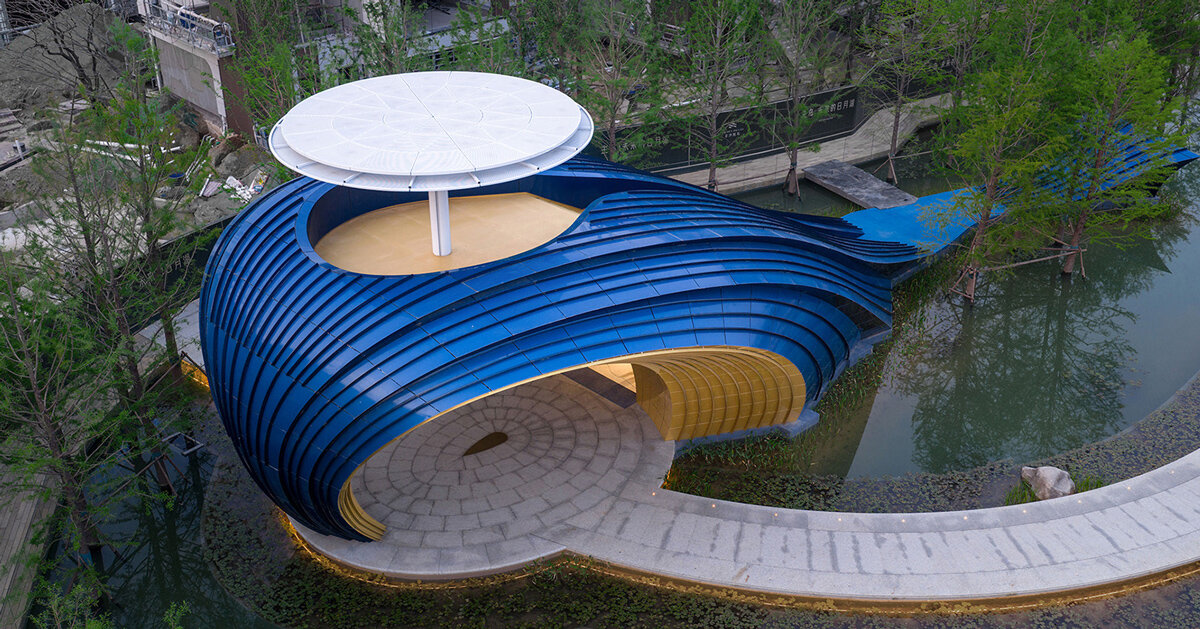 blue aluminum panels shape whale-like gate by wutopia lab