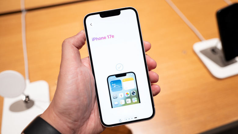 The iPhone 17e in hand.