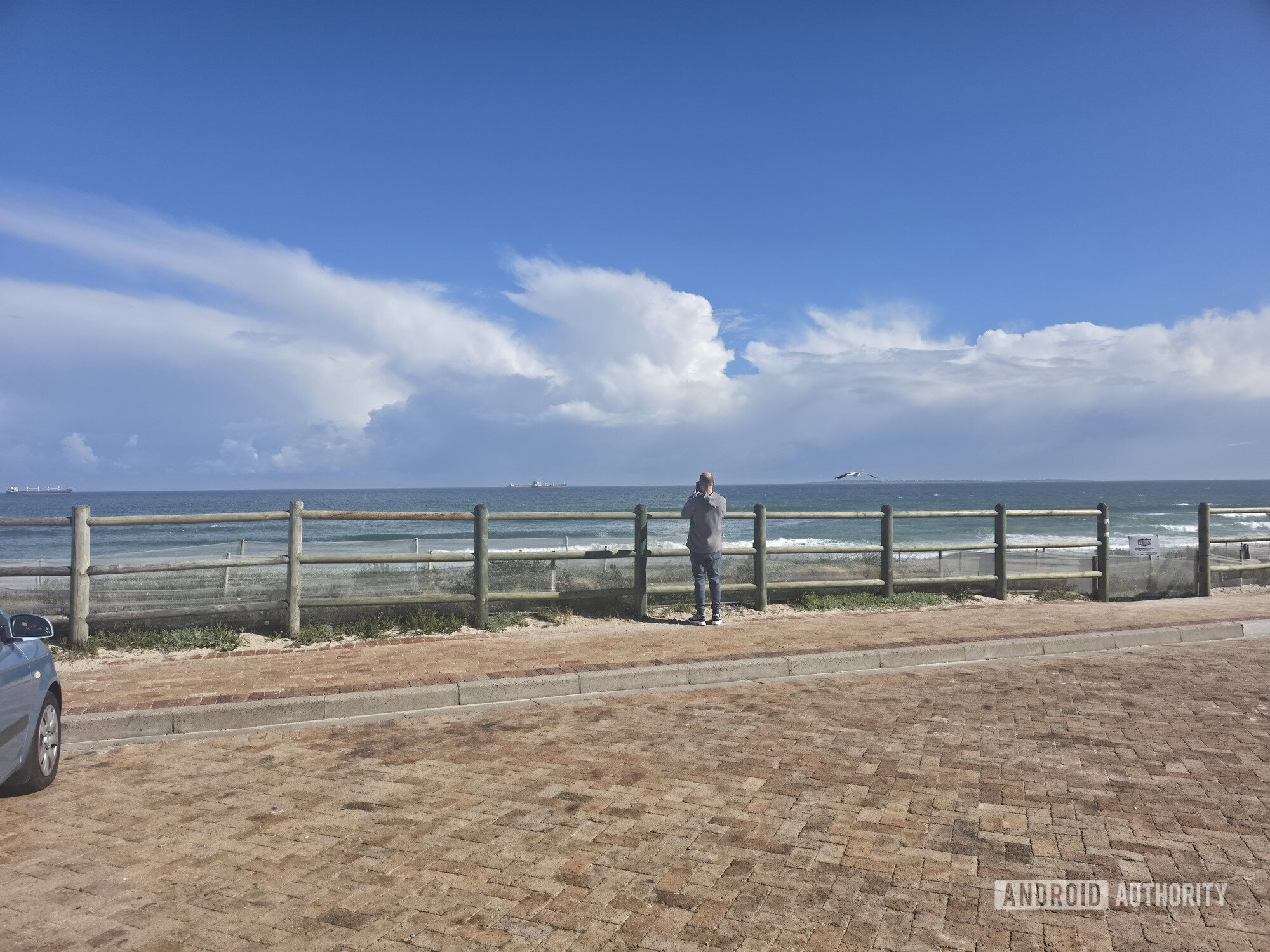 zoomed out photo of beach promenade