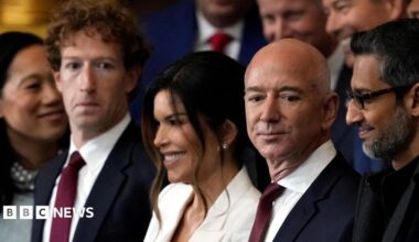 Meta CEO Mark Zuckerberg stands in a crowd next to amazon Chairman Jeff Bezos and Google CEO Sundar Pichai.