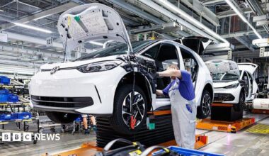 Man working on a VW production line