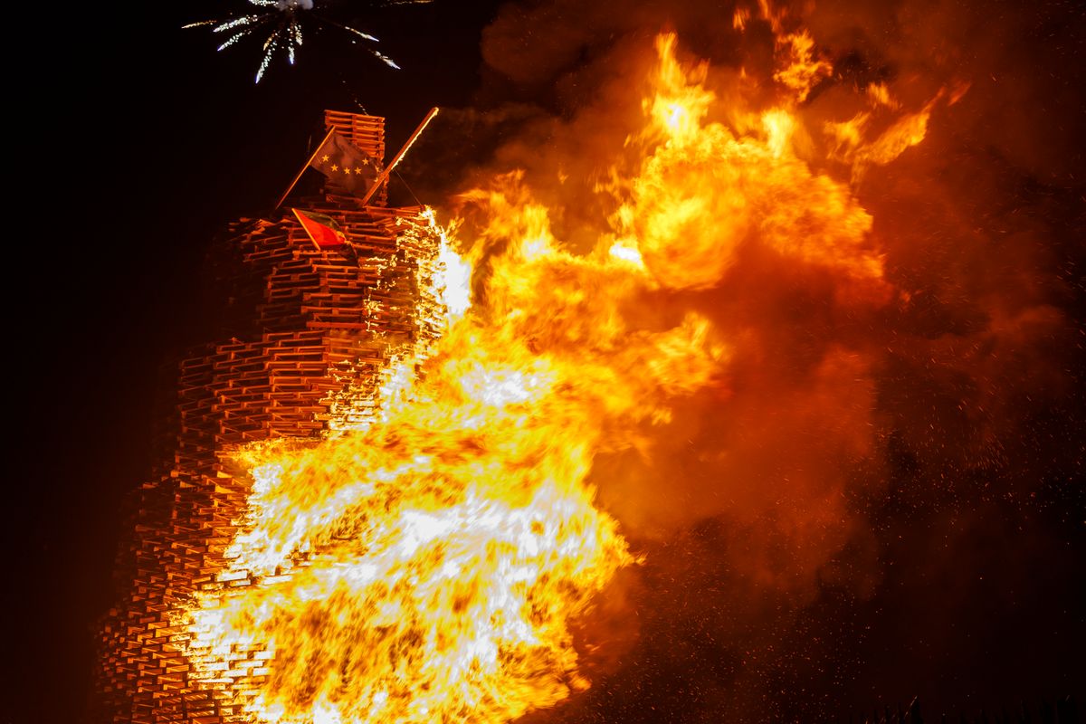 A bonfire burns at Roden Street in Belfast in the early hours of Sunday as part of events marking the Twelfth of July