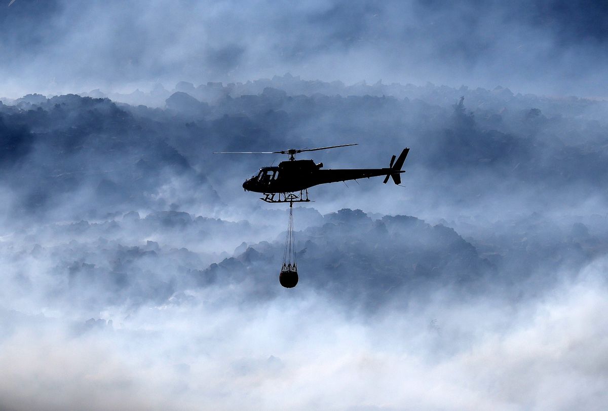 Water was dropped on the site by United Utilities helicopters