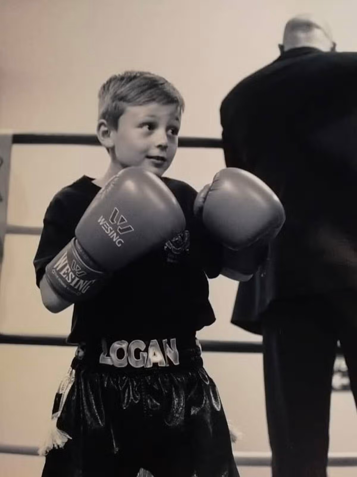 Logan as a child at his boxing club