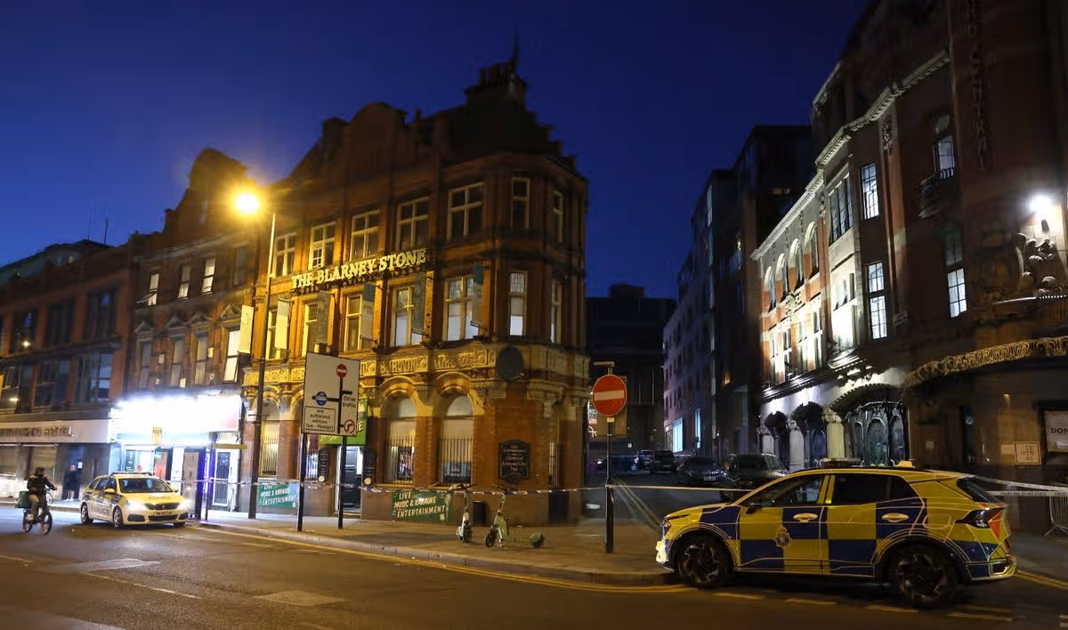 Police at the scene outside The Blarney Stone pub on Friday evening