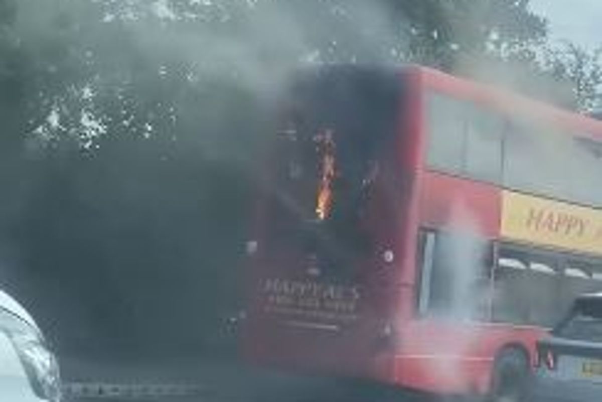 Double-decker bus on fire on East Lancs Road