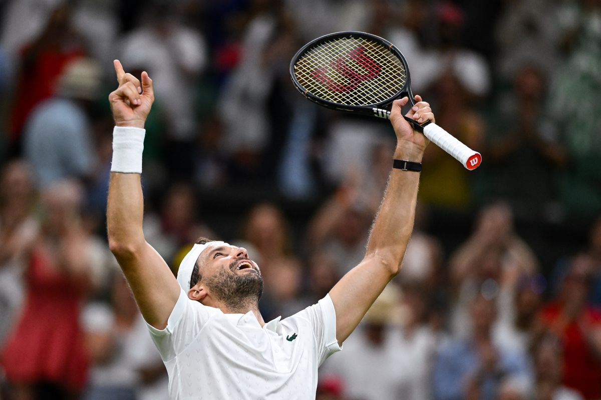 Grigor Dimitrov of Bulgaria celebrates winning match point against Matteo Berrettini of Italy during the Gentlemen's Singles third round match on Day Six of The Championships Wimbledon 2026 