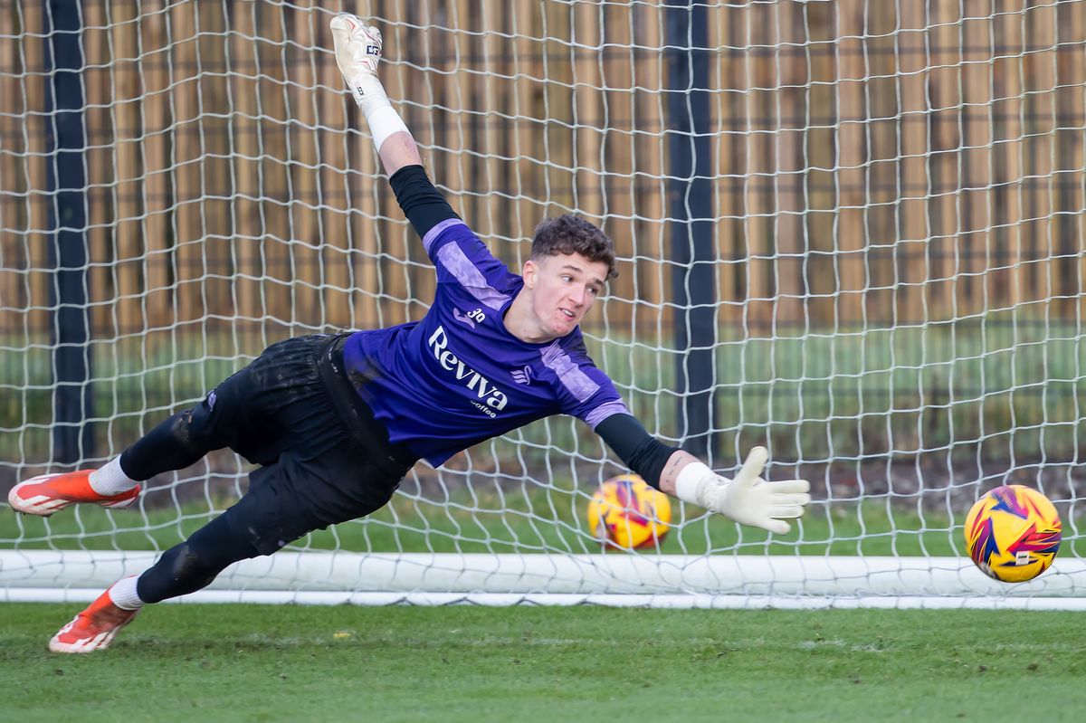 Kit Margetson of Swansea City stretches to save the ball during the Swansea City Training Session at Fairwood Training Ground