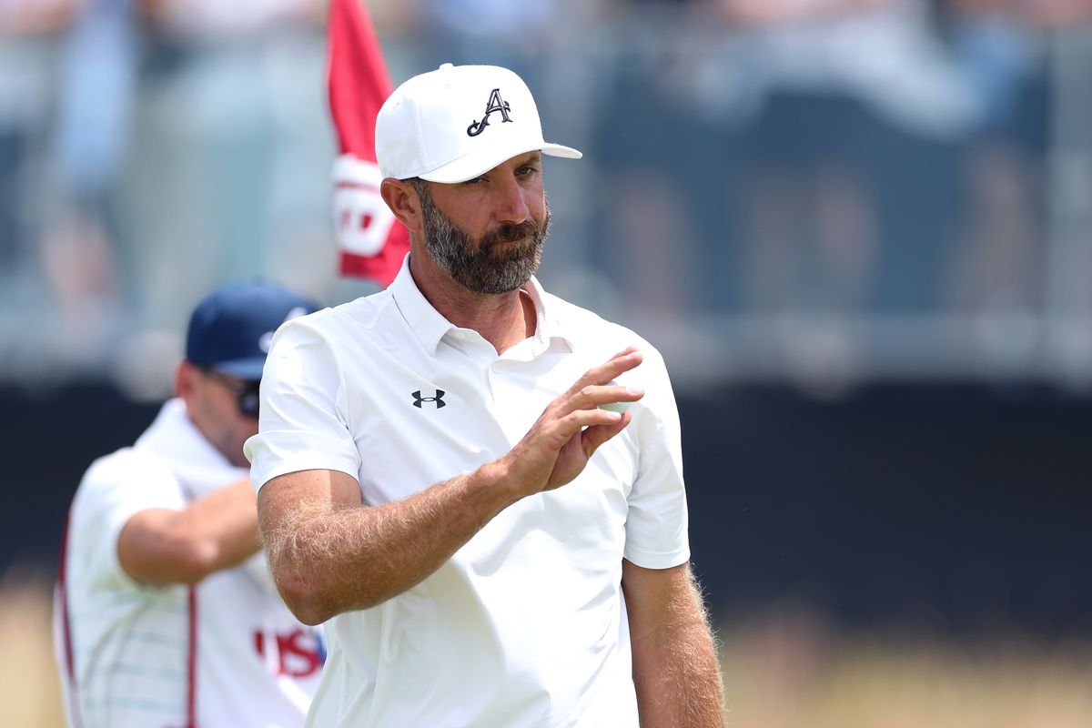 Dustin Johnson of the United States acknowledges the crowd after making birdie on the 16th green during the second round of the 126th U.S. OPEN at Shinnecock Hills Golf Club