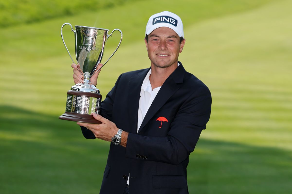 Viktor Hovland of Norway poses with the trophy after winning the Travelers Championship 2026 in a playoff at TPC River Highlands on June 29, 2026 in Cromwell, Connecticut