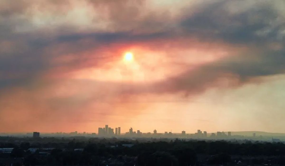 Smoke seen from Reddish shows it smothering Manchester