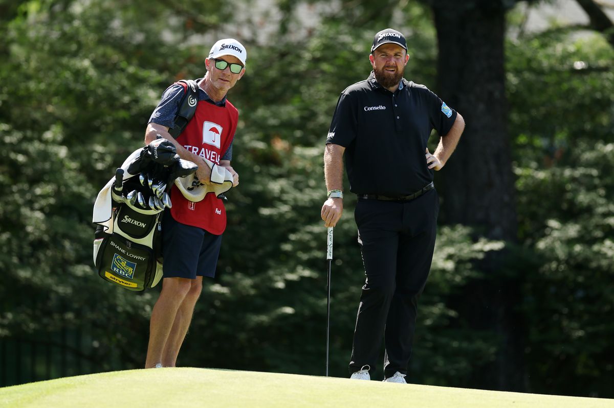Shane Lowry pictured with caddie Dermot Byrne during the final round Travelers Championship at TPC River Highlands