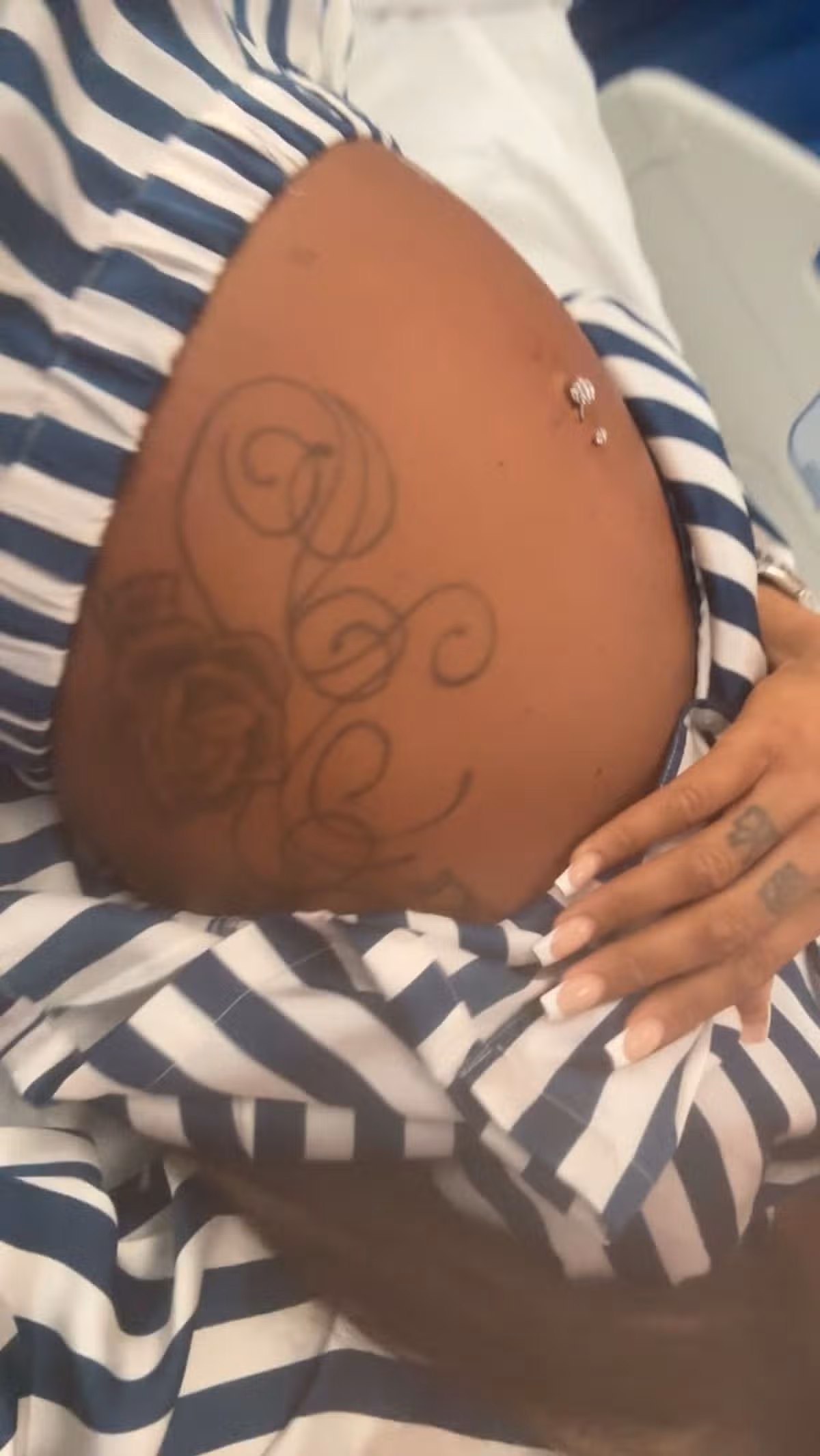 Cydnie's swollen belly