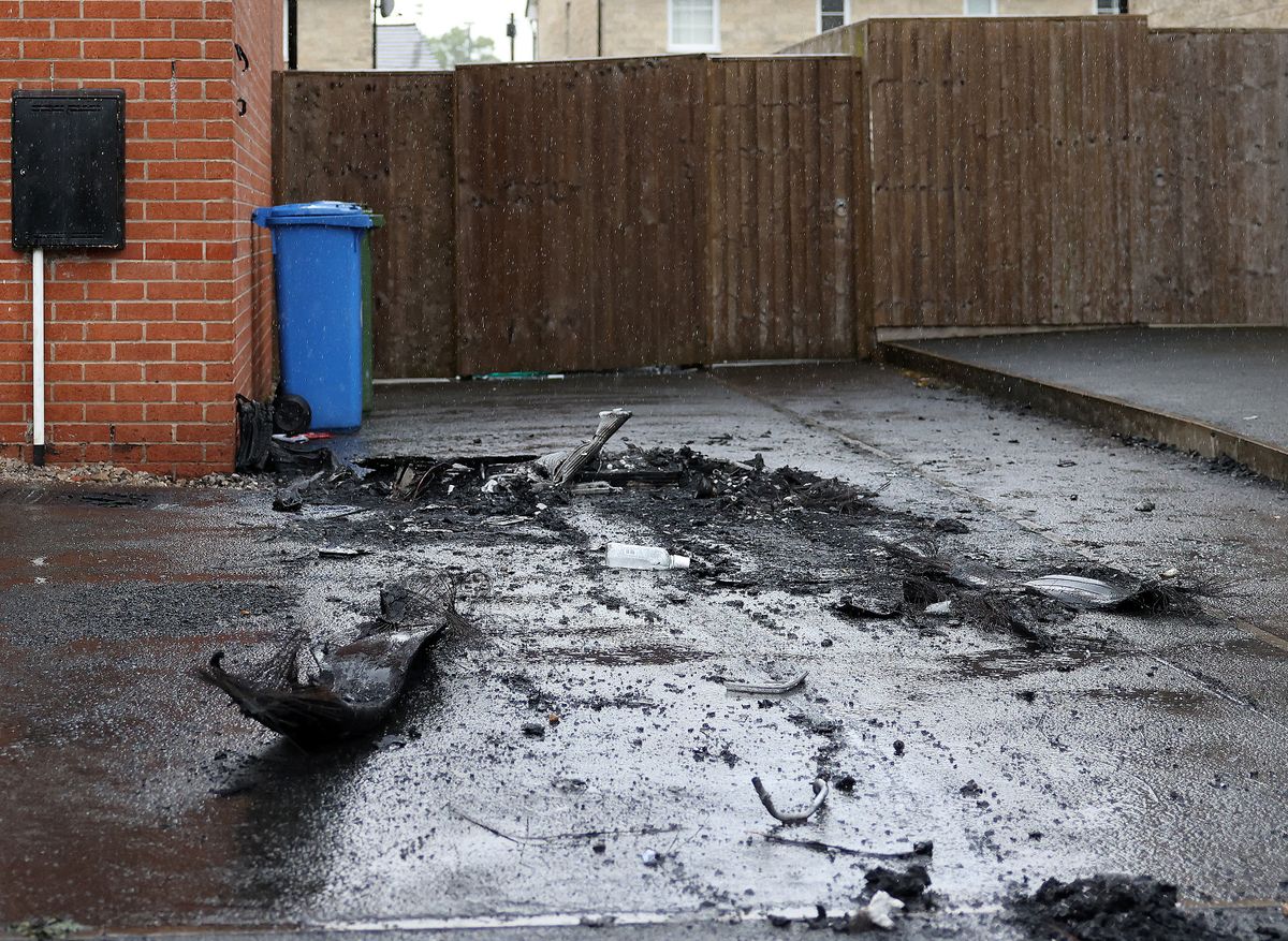 A photo of the burnt driveway