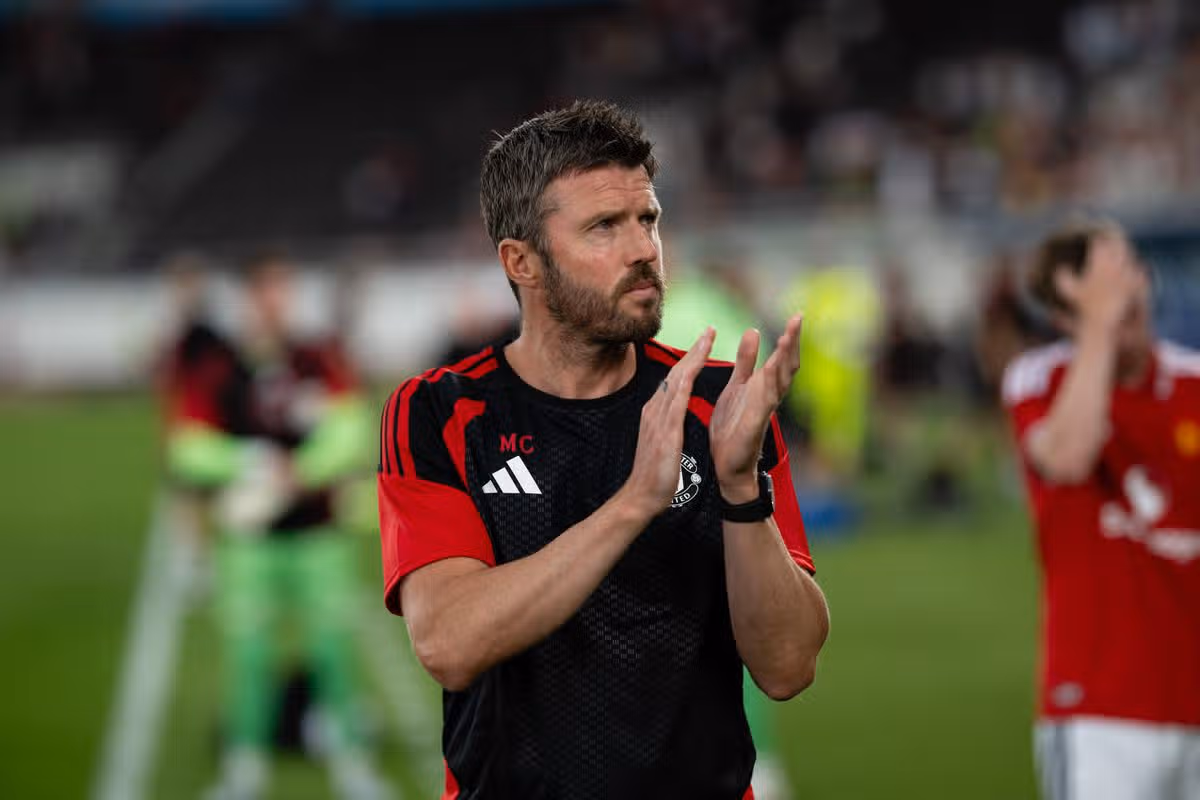 Manchester United Head Coach / Manager Michael Carrick applauds the fans at the end of the pre-season friendly match between Manchester United and AFC Wrexham at Helsingin Olympiastadion on July 18, 2026 in Helsinki, Finland