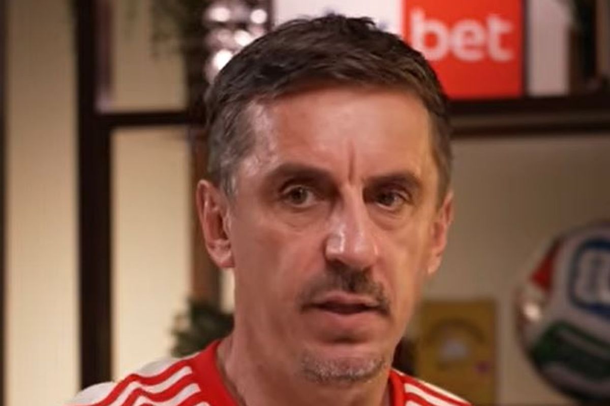 Gary Neville looks on 