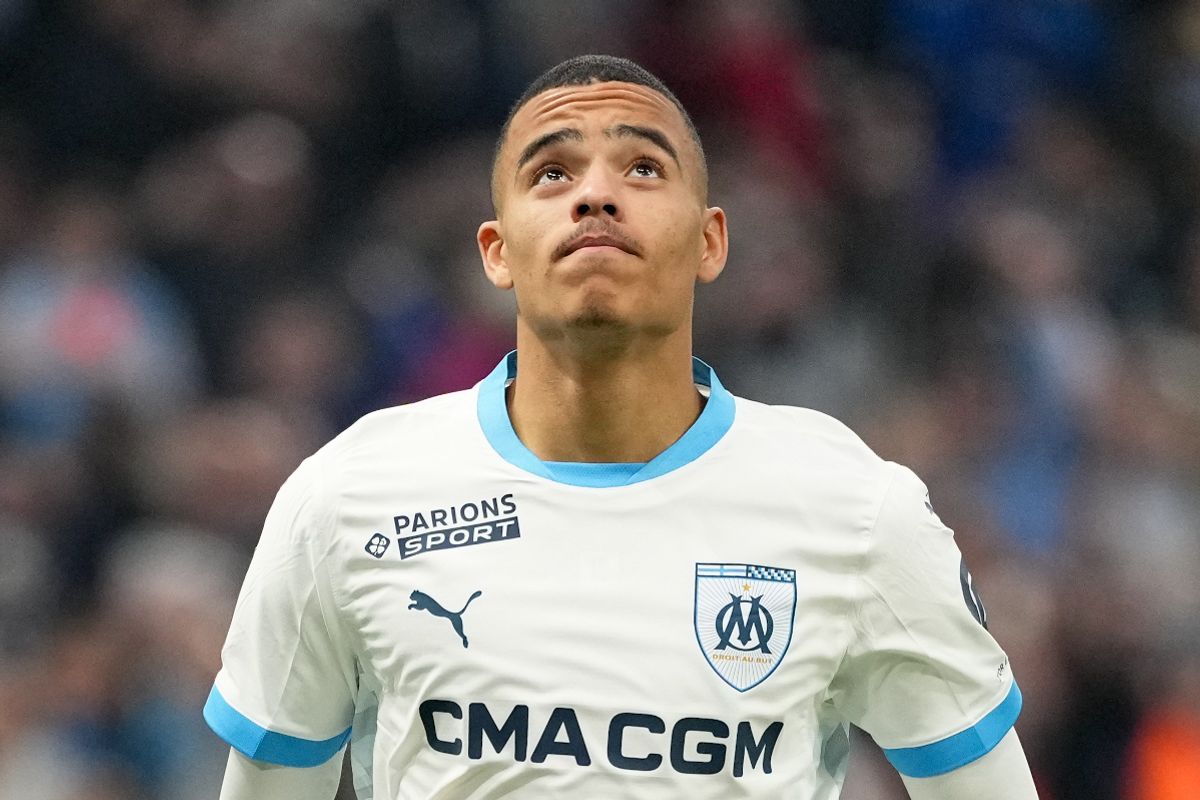 Mason Greenwood looks on