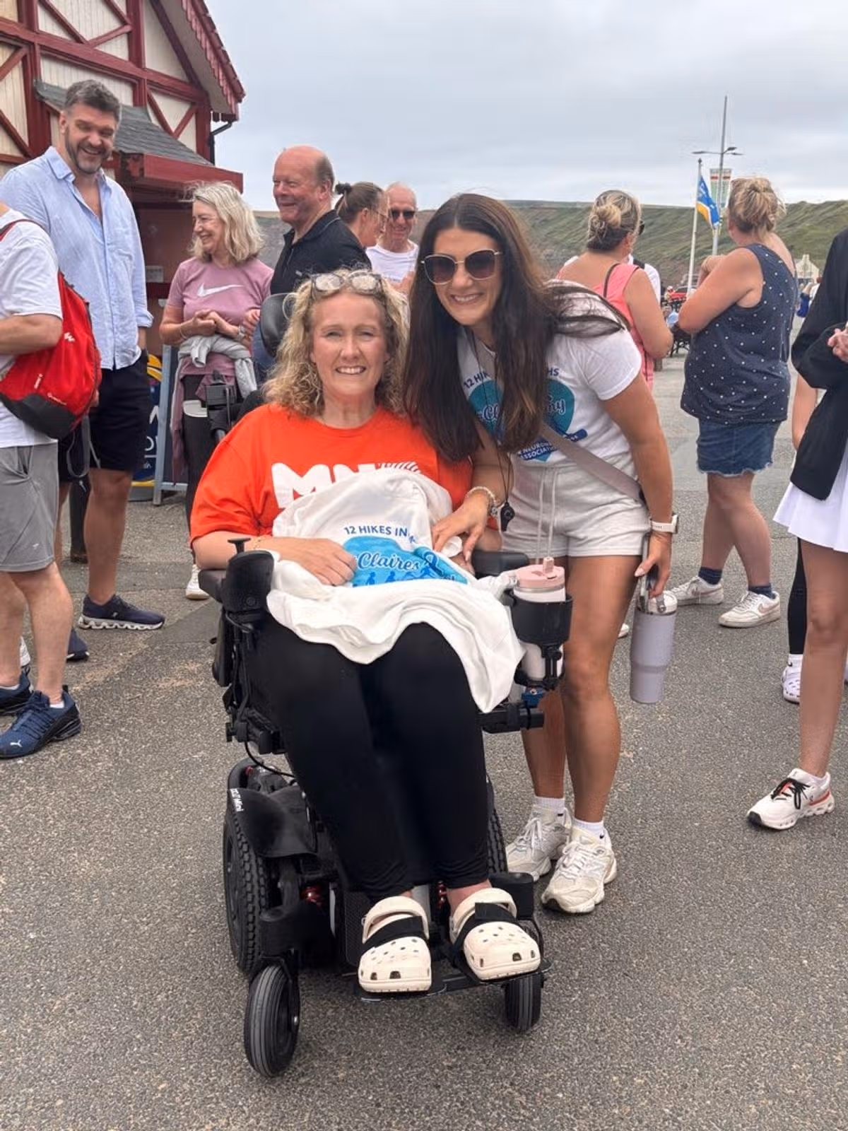 Beloved headteacher Claire Park (left) was at the finish line to meet the supporters, including her best friend organiser Gillian Ball