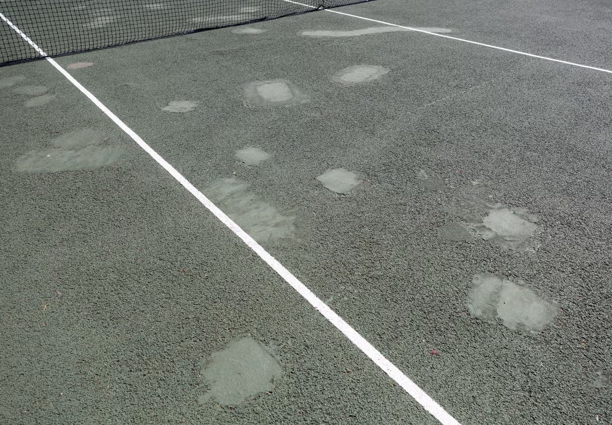 Worcester Park Tennis Club's patchy courts