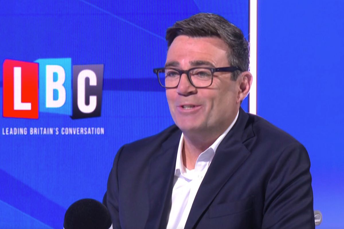 Andy Burnham vowed not to make 'crude cuts' to benefits and pledged action on energy costs