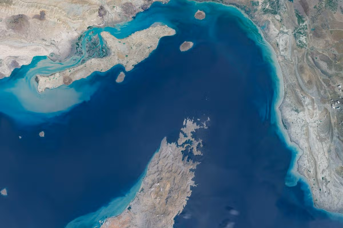 STRAIT OF HORMUZ, IRAN/OMAN -- APRIL 7, 2026: Maps4Media processed and enhanced Sentinal-2 satellite imagery shows a broad view of the Strait of Hormuz between southern Iran and Oman's Musandam Peninsula, including surrounding islands, coastal terrain, and turquoise shallow-water zones at the entrance to the Persian Gulf. The image provides regional context of one of the world's most strategically important maritime chokepoints for global oil and commercial shipping. Please use: Satellite image (c) 2026 Maps4media. (Photo enhanced and published by maps4media via Getty Images)