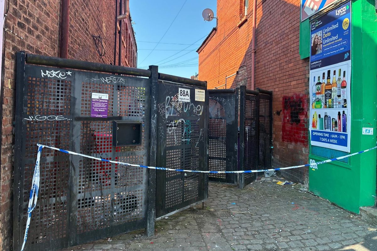 Police cordon off alleyway on Aigburth Road, close to Sandhurst Street