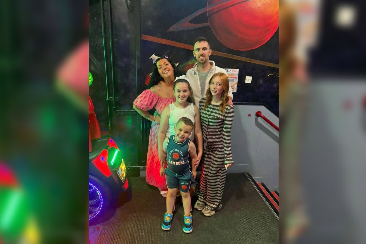 John with Jorja 15, Paris-Cole, eight, and Clay-Ty, four, and wife Nicole
