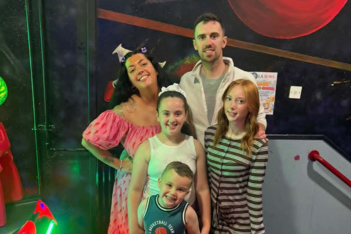John, Jorja 15, Paris-Cole, eight, and Clay-Ty, four, and wife Nicole, 29