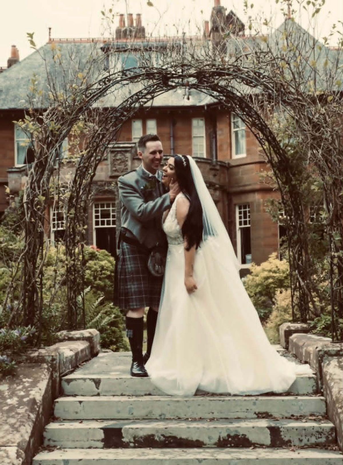 John and Nicole laughing on wedding day