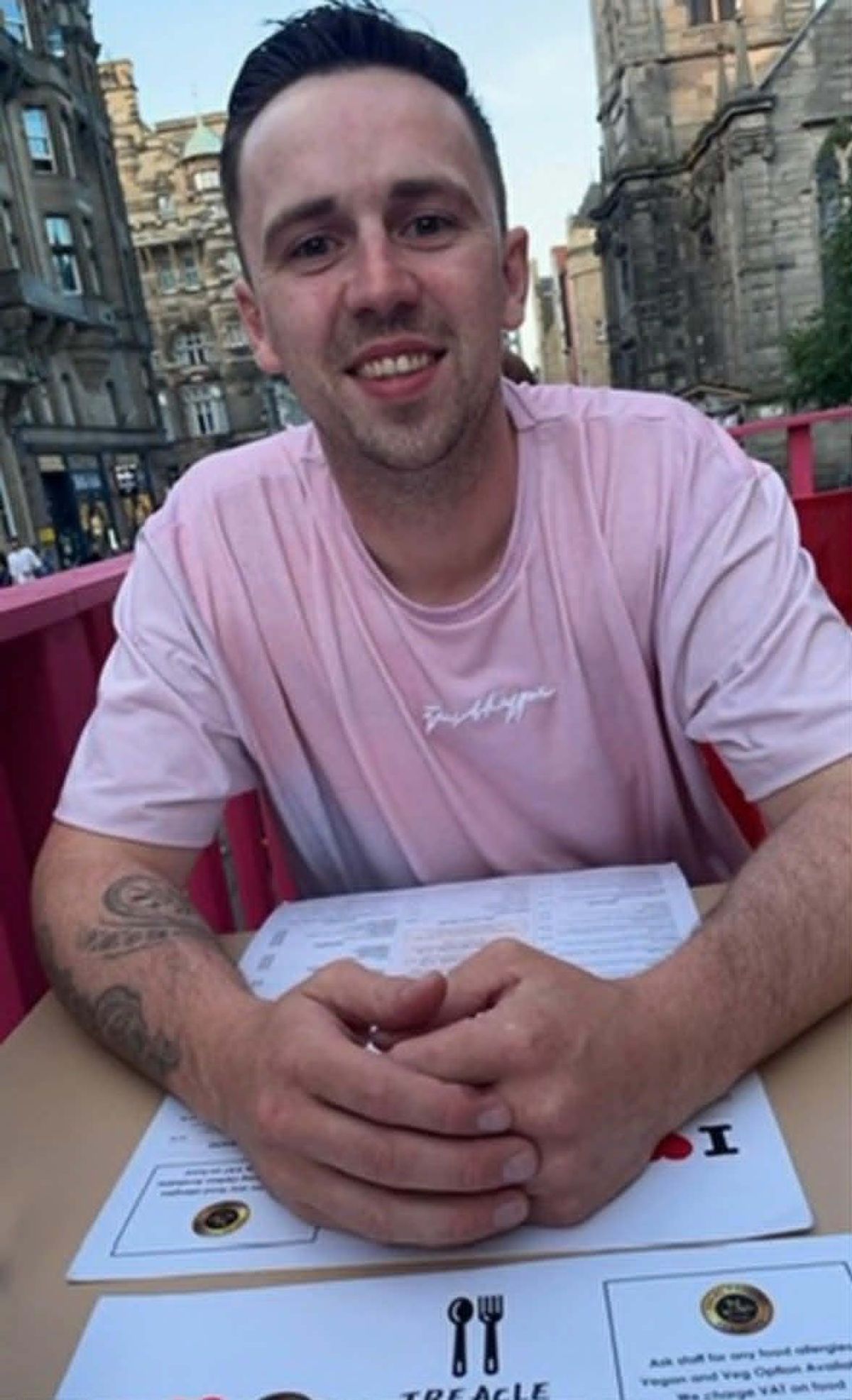 John smiling while out for dinner in Edinburgh