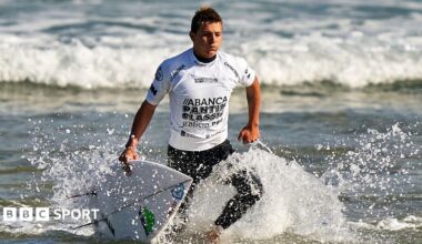 Arran Strong competing at a surfing event in Spain in 2020
