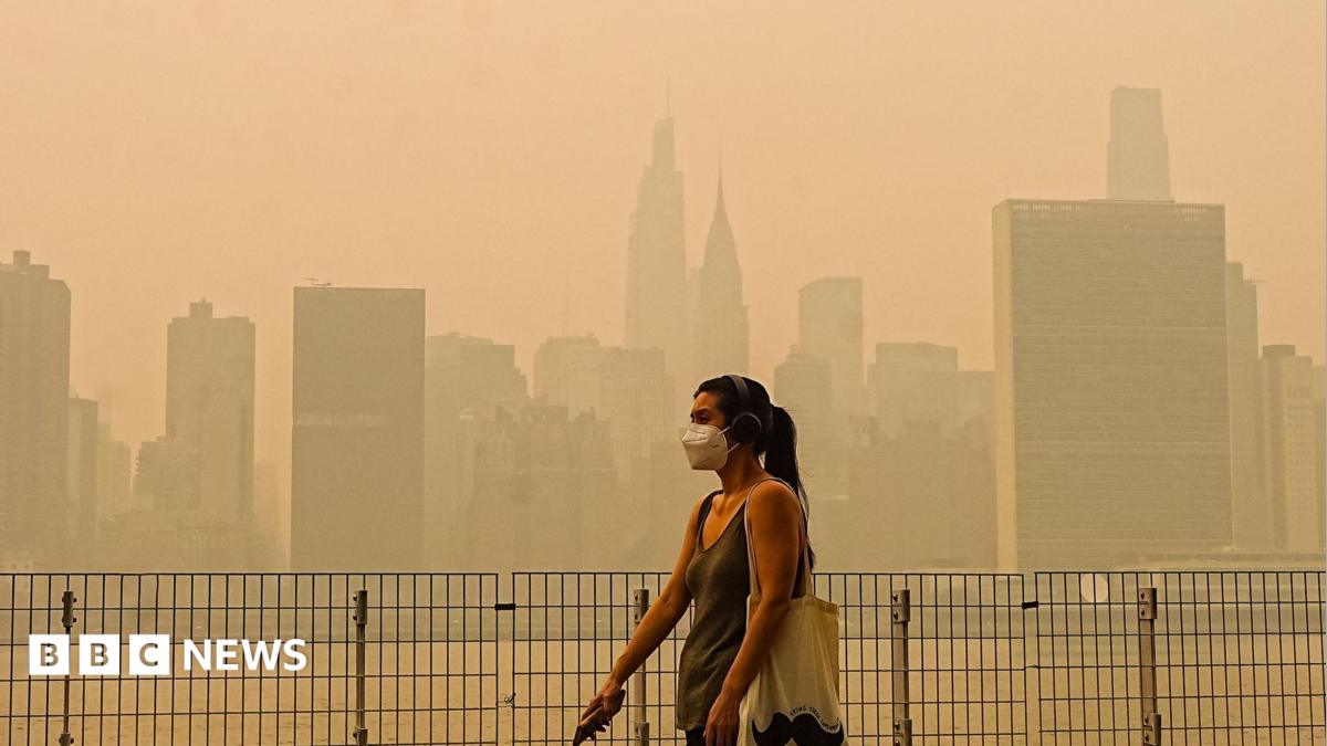 Smoke from massive wildfires in Canada engulfed the New York City skyline, reducing visibility and casting an orange haze over the New York City