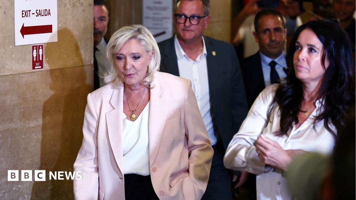 French court clears way for Marine Le Pen to run for president but orders her to wear electronic tag