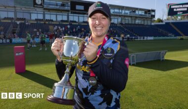 Glamorgan captain Lauren Parfitt lifting the Vitality Women's T20 Blast League 2 trophy after defeating Gloucestershire.