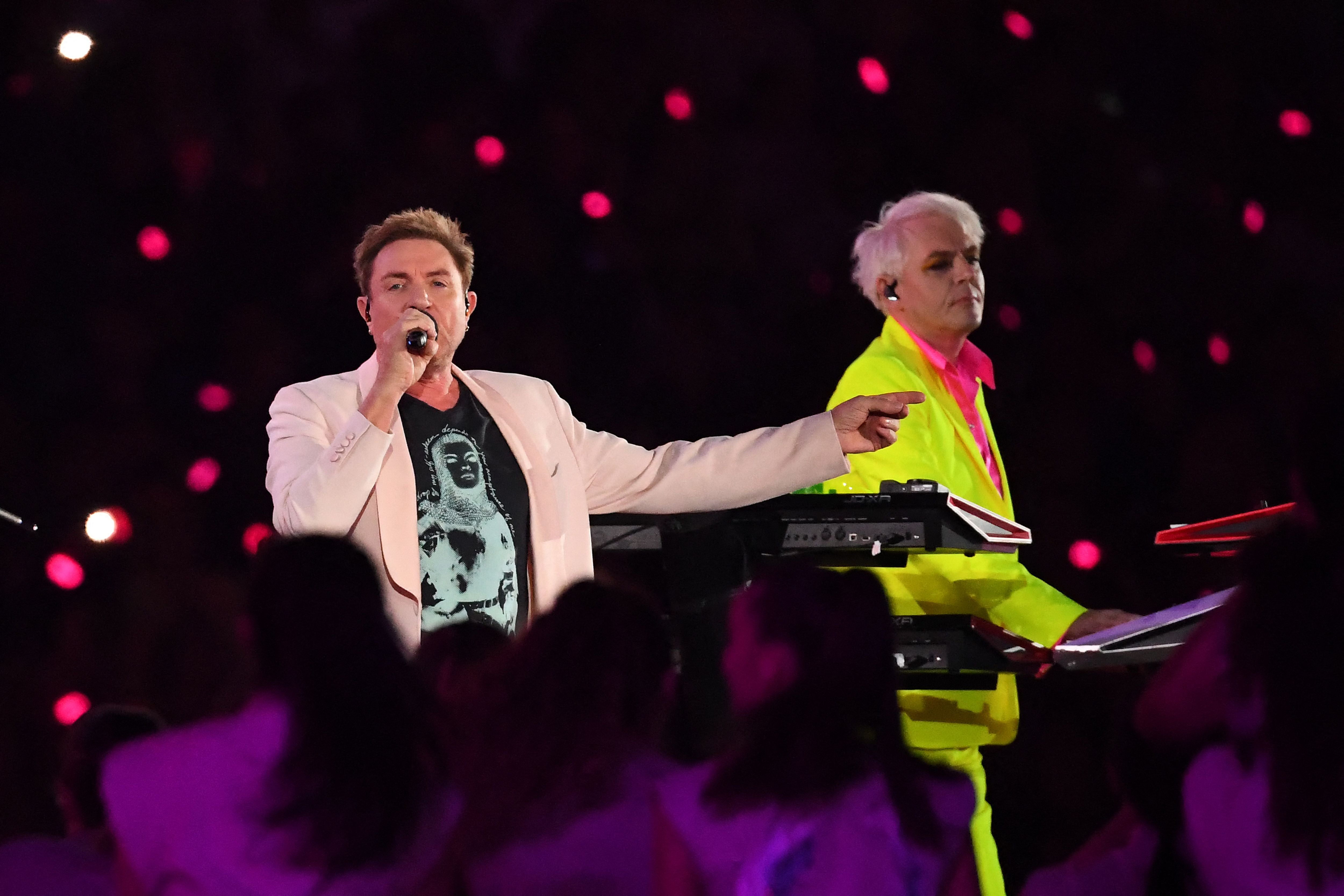 Duran Duran's singer Simon Le Bon and Rhodes perform during the opening ceremony for the Commonwealth Games at the Alexander Stadium in Birmingham, 2022