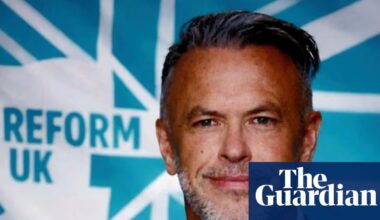 Reform UK councillor charged after alleged racist social media post | UK news