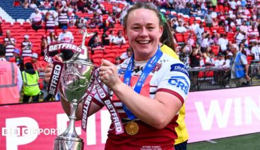 Mary Coleman, holding the Women's Challenge Cup