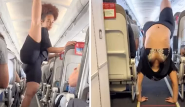 Fitness influencer does yoga in middle of plane aisle during packed flight