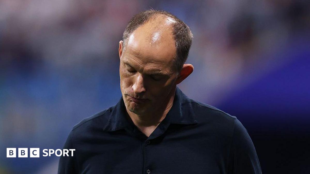 Thomas Tuchel, manager of England, bows his head during the FIFA World Cup 2026 semi-final match between England and Argentina