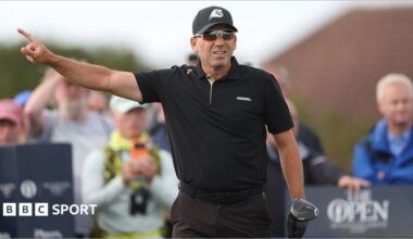 Sergio Garcia holding a driver and pointing