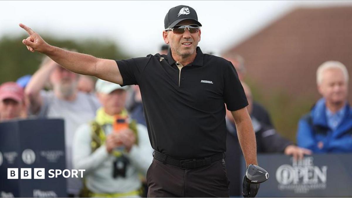 Sergio Garcia holding a driver and pointing