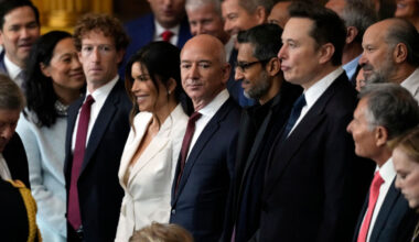 Mark Zuckerberg, Jeff Bezos, Elon Musk, and Sundar Pichai in a business meeting discussing future tech innovations.