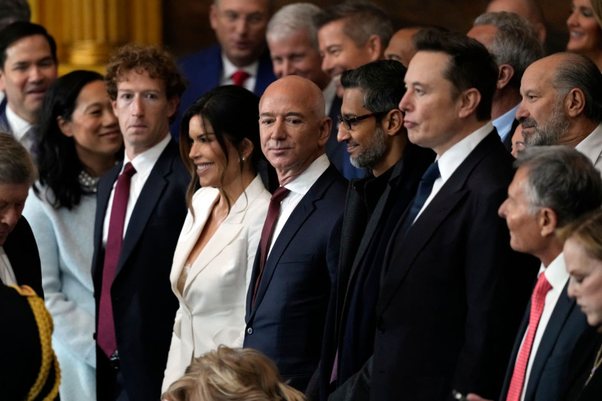 Mark Zuckerberg, Jeff Bezos, Elon Musk, and Sundar Pichai in a business meeting discussing future tech innovations.